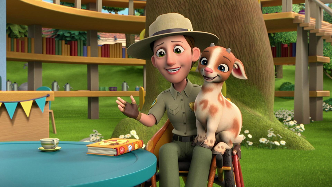 Park Ranger Rose holding an animal at the park.