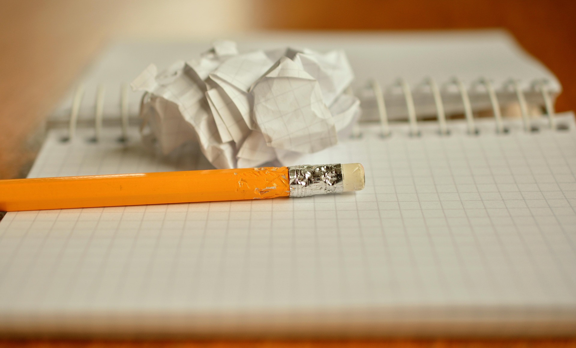 Lined notebook with pencil